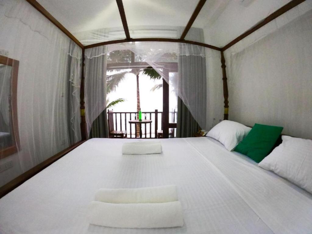 Asa Bay Beach Resort ตัลป์ ภายนอก รูปภาพ